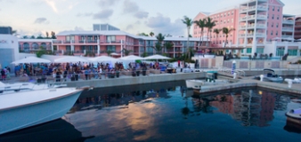A waterfront event at Hamilton Princess & Beach Club while the sun goes down